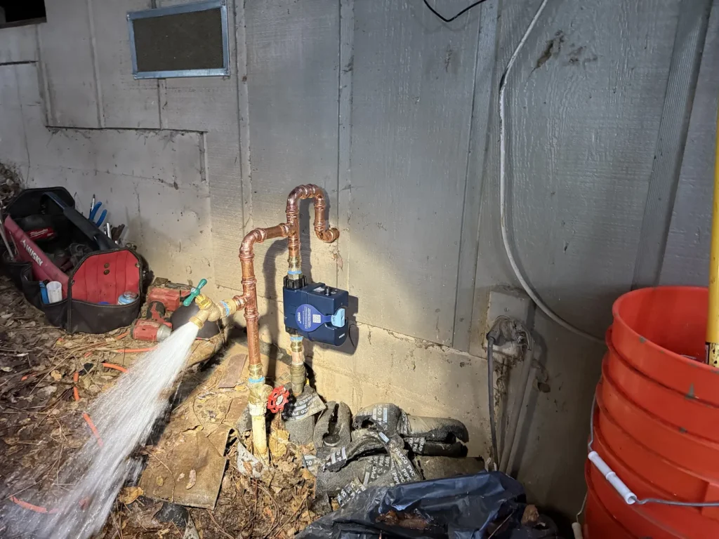 The Moen detector installed in the revised copper pipework.