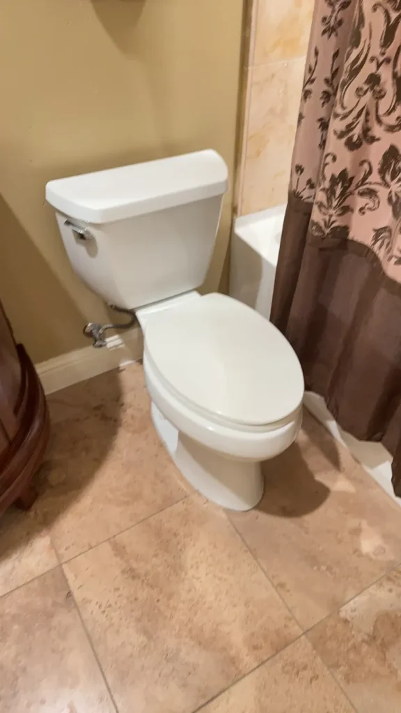 The toilet documented during the bathroom service visit.